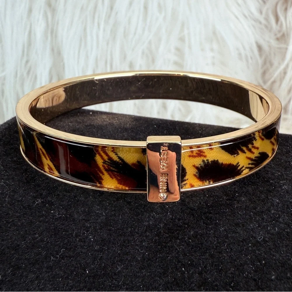 Beautiful, goldtone, animal print nine west bangle bracelet